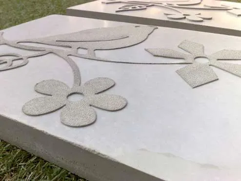 Afdruk, tekening, tekst, symbolen in beton